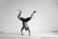 Underwear Gymnastic poses Man Black Muscular Bald Dancing Dynamic poses Academic